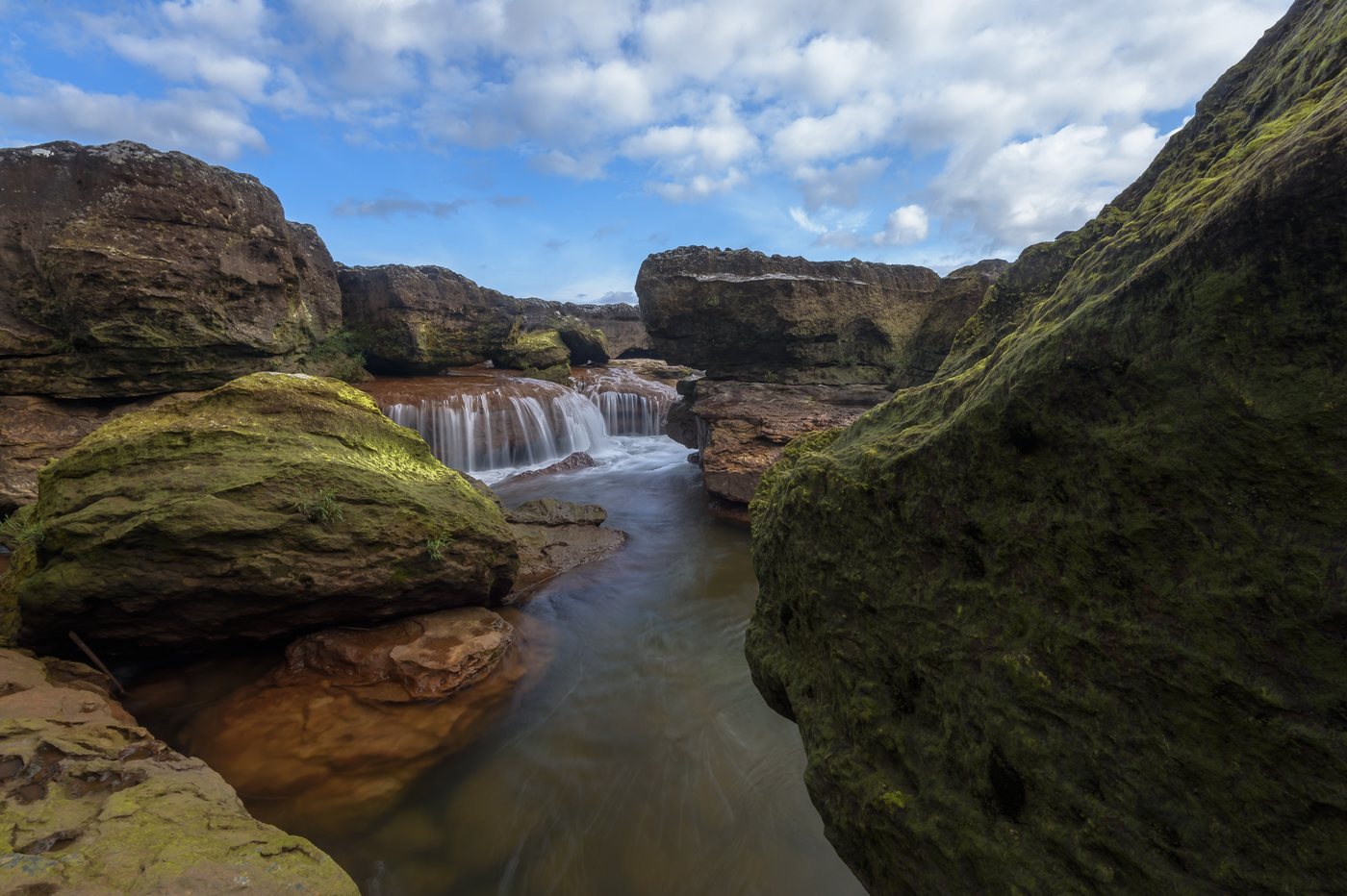 A stream over mossy rocks