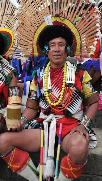 An Angami man in festival dress at the Hornbill Festival, Nagaland