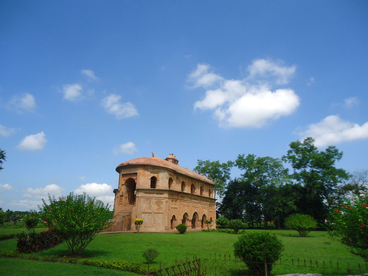 The Rang Ghar pavilion in Sivasagar under a blue sky