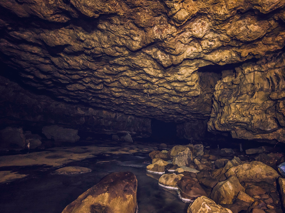 Rock formations and pools inside a limestone cave