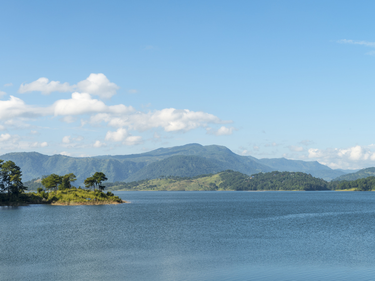 Umiam Lake among forested hills on the way to Shillong