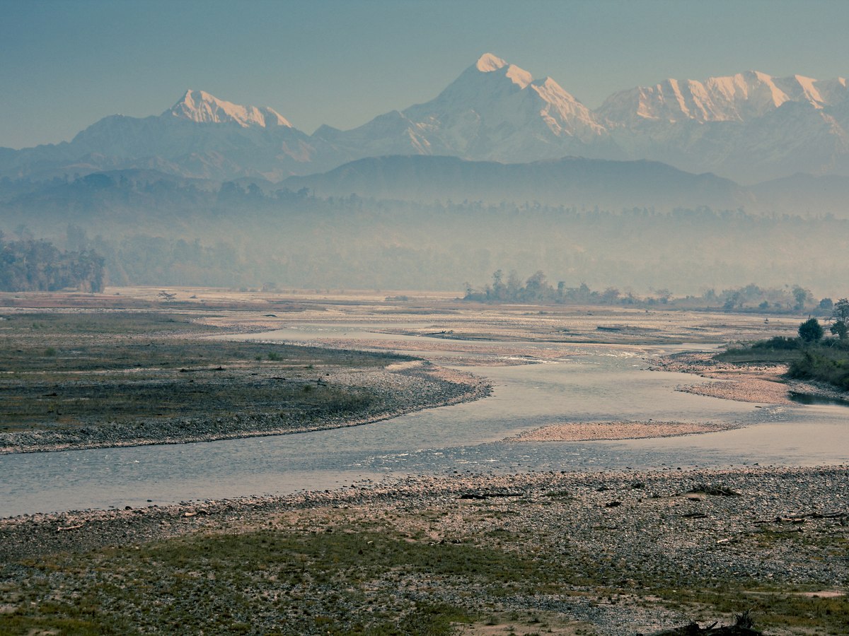 The Noa-Dihing river valley with the Himalayas beyond