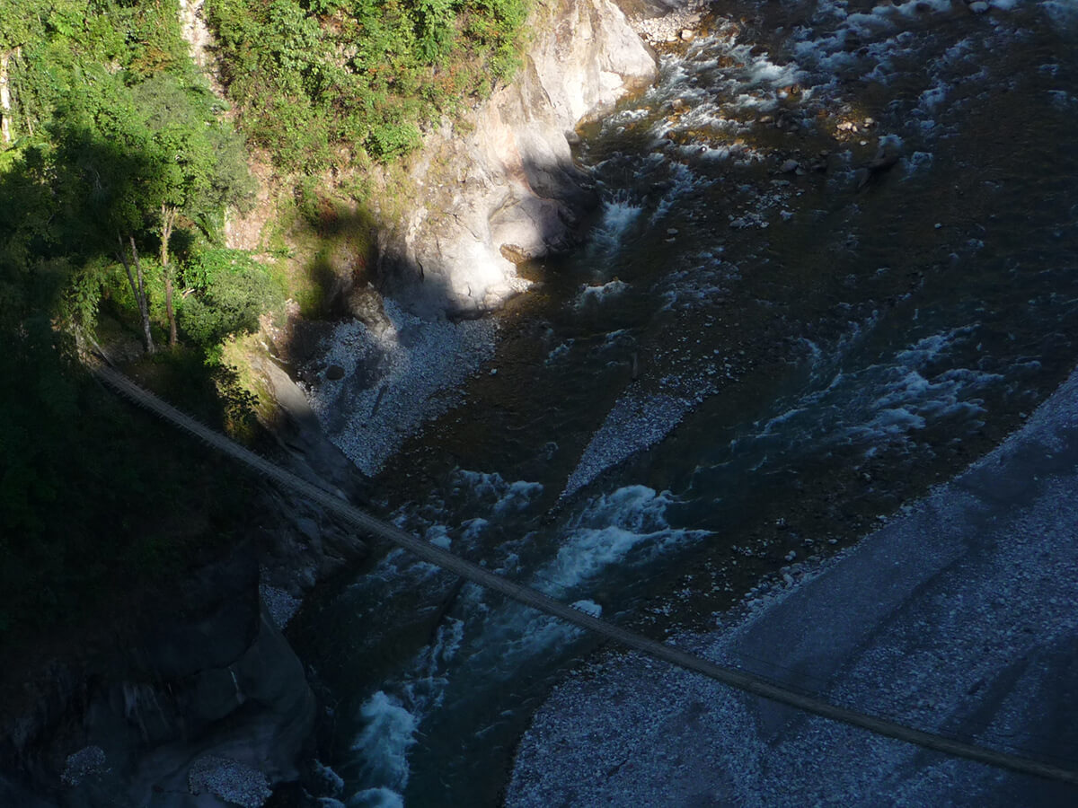 Rapids running through a steep rocky gorge